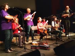Uke group from Staynor ON! Grandparents on stage with their grandkids and friends!