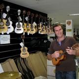 I was just in Brazil, and almost bought a Cavaquinho: The Brazilian cousin to a ukulele. They are tuned half and octave higher, and have steel strings.